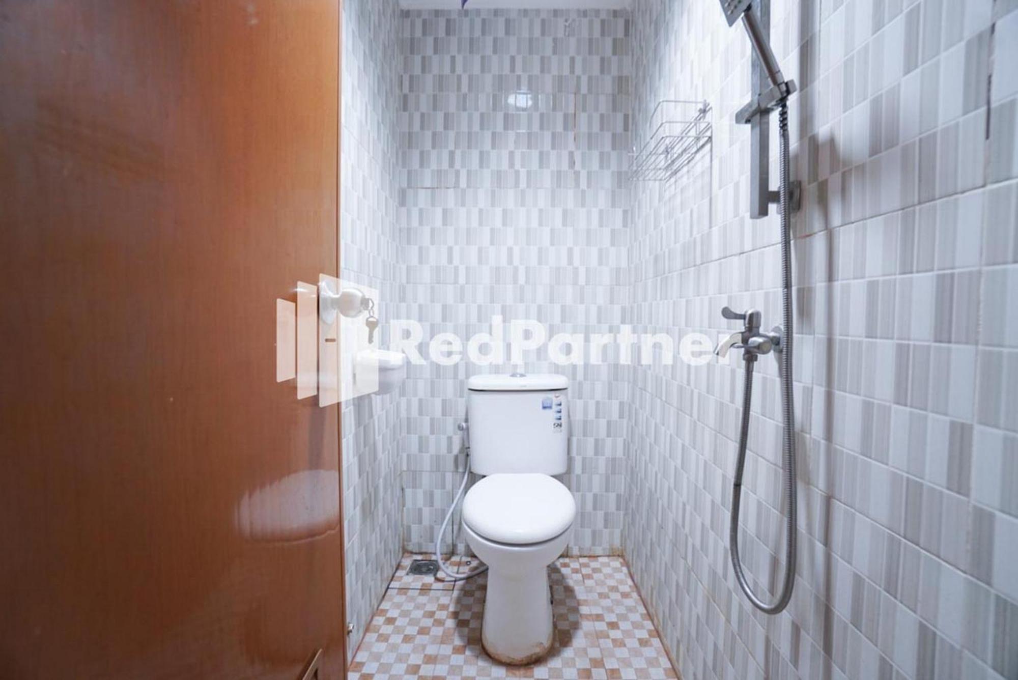 Eascot Hotel Mitra Reddoorz Jacarta Quarto foto